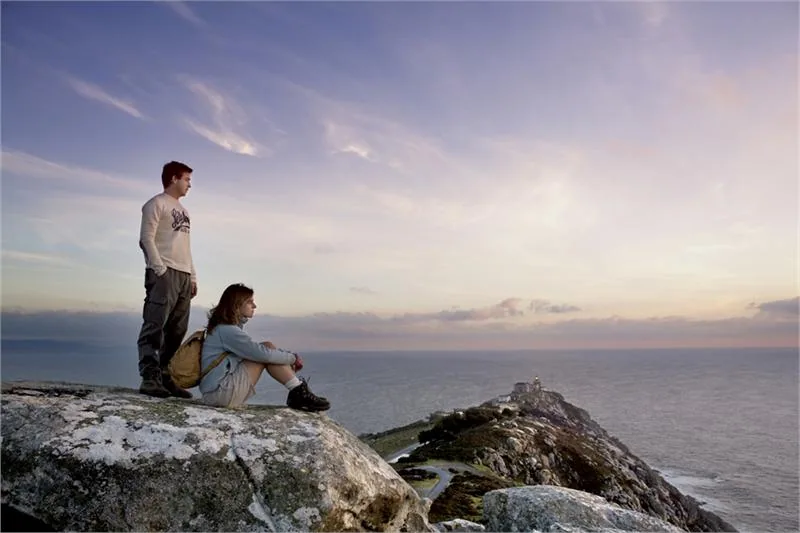 Pilgrims on Cape of Fisterra
