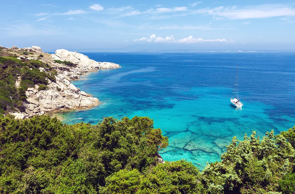Blue-sea-and-coast-view-with-lonely-yacht-in-Sardini-compressor