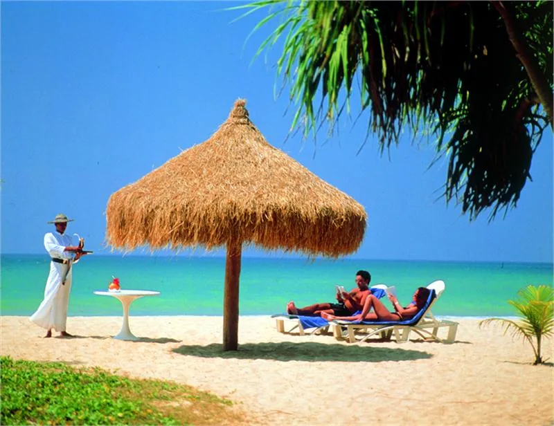 Sun tanning at one of the many beautiful sandy beaches