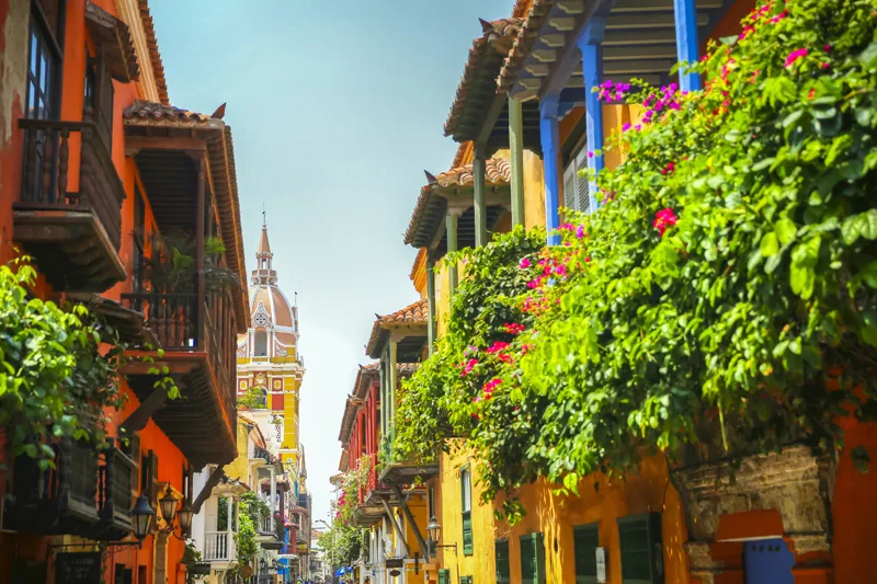 Cartagena, Columbia - April 4, 2017: Lush balcony planters along the street looking towards town square in the old town of Cartagena Columbia