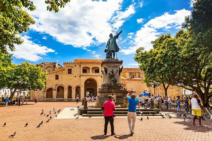 Santo Domingo, Dominican Republic - March, 2020: Columbus Statue and Cathedral in Columbus Park or Parque Colon. World Famous landmarks in Santo Domingo, Domini