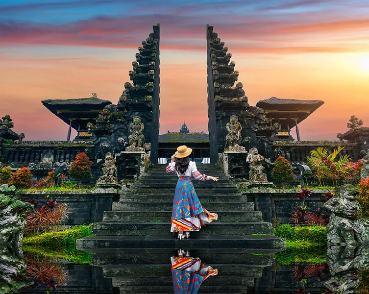 Women tourists standing at Besakih temple in Bali, Indonesia.