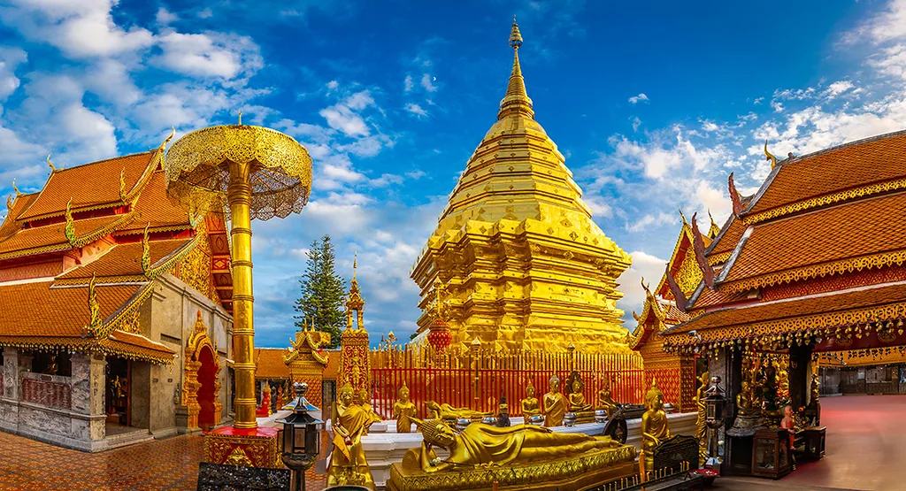 Panorama landscape of Wat Phra That Doi Suthep or golden temple with ancient golden pagodas and Buddha statues is famous visiting place or landmark and attracti
