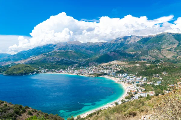 Panoramic view from the top on the resort Himare town. Beautiful summer cloud mountain landscape. Ionian sea. Albania.